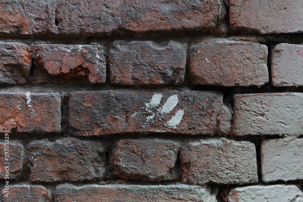 Handprint in paint on a brick wall in old Moscow. Background. Texture. Handprint in paint on a brick wall in old Moscow. Background. Texture.