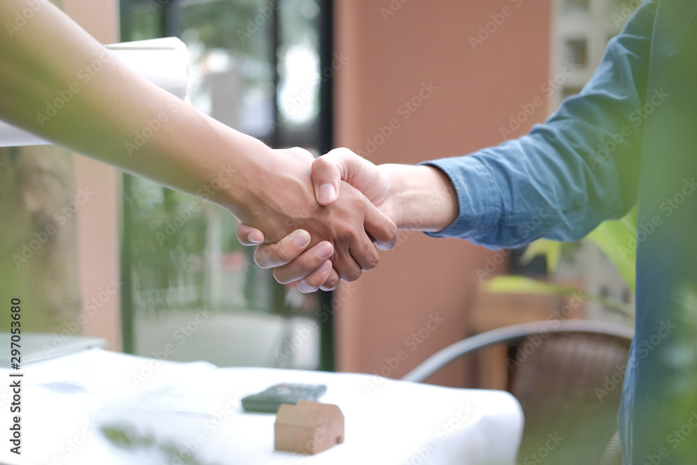 architect shaking hands after meeting. engineer handshaking after conference. teamwork partnership cooperate concept.