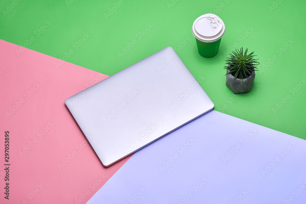 blank notebook page on pastel colored background office desk with different objects blank notebook page on pastel colored background office desk with different objects