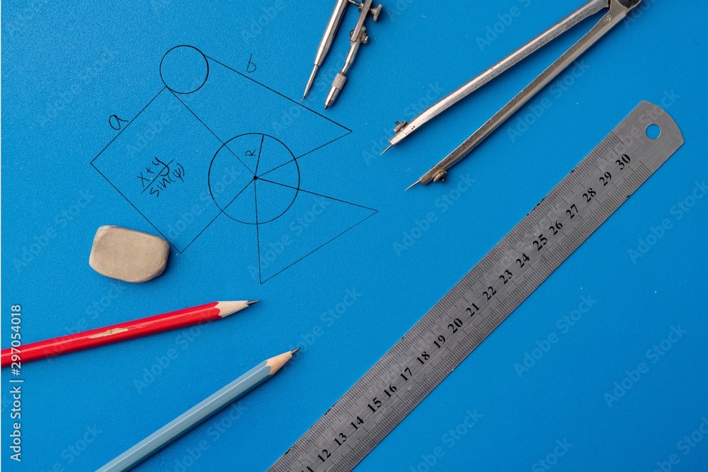 drawing a plan on a color surface using the pencil, ruler, compass and other tools, geometry shapes drawing a plan on a color surface using the pencil, ruler, compass and other tools, geometry shapes
