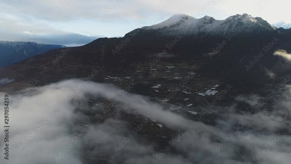 Tibet, the Himalayas. Aerial view of floating clouds near the Himalayan mountains. Tibet, the Himalayas. Aerial view of floating clouds near the Himalayan mountains.