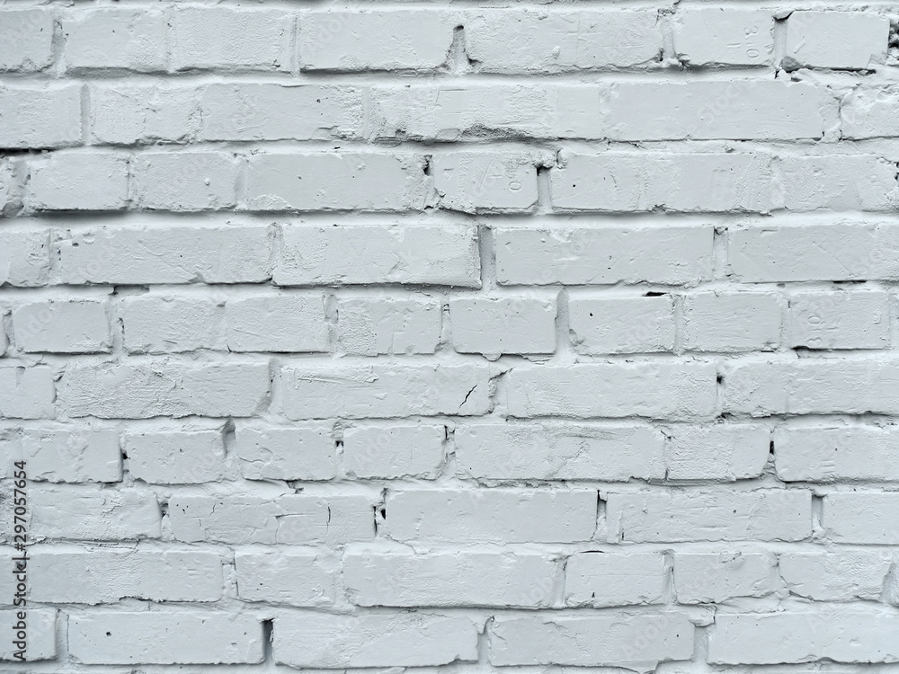 Obraz premium Rough white painted brick wall 