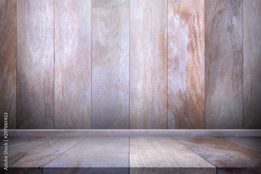 Wood table top with wooden wall background. Used for product placement or montage. Wood table top with wooden wall background. Used for product placement or montage.