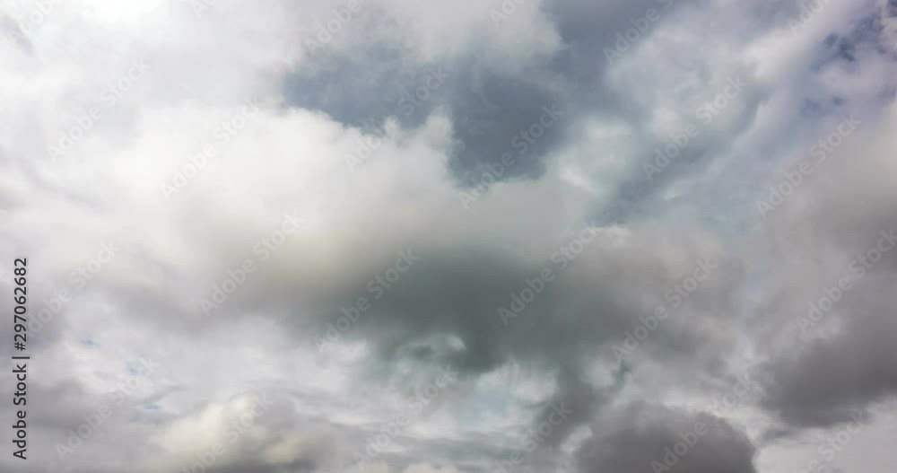 Timelapse of moving rolling puffy clouds. Flying through the clouds 4K Timelapse of moving rolling puffy clouds. Flying through the clouds 4K