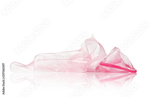 Close up broken condom and reflect of condom isolated on white background. The signs of sexually transmitted disease.