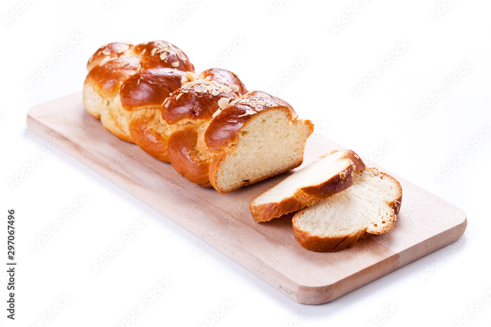 Sliced Homemade Brioche On A Cutting Board Isolated On White