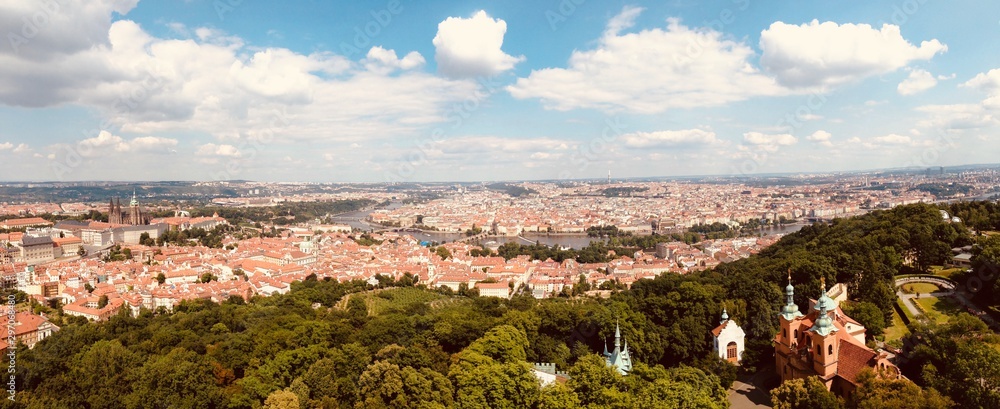Panoramic view of Prague from hill top on a sunny day