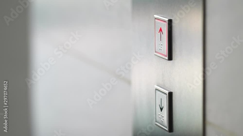 Finger Pressing Elevator Button Up in Office Center or Hotel. Progress Future Startup Concept Footage. 4K Slowmotion. photo