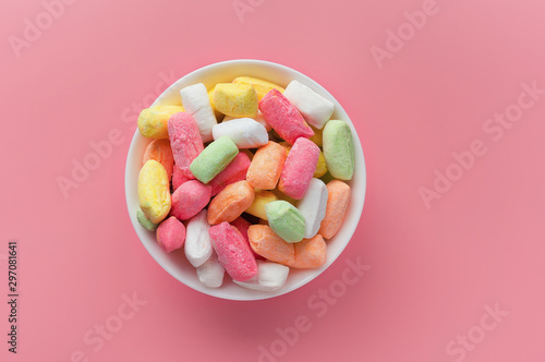 Uzbek National Caramel  candy  on pink pastel background. Top view.