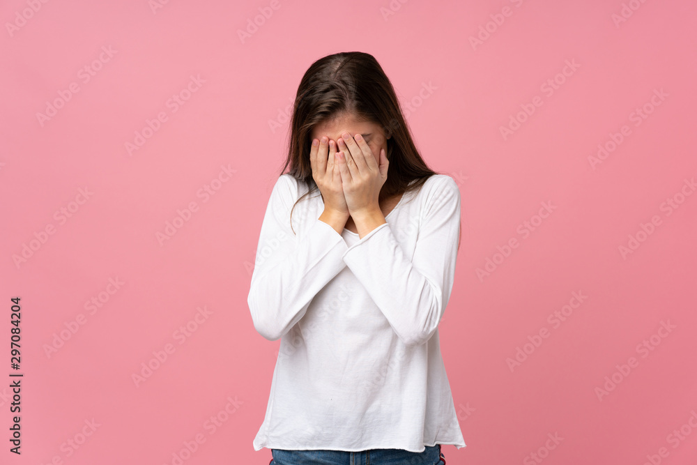 Young woman over isolated pink background with tired and sick expression Young woman over isolated pink background with tired and sick expression