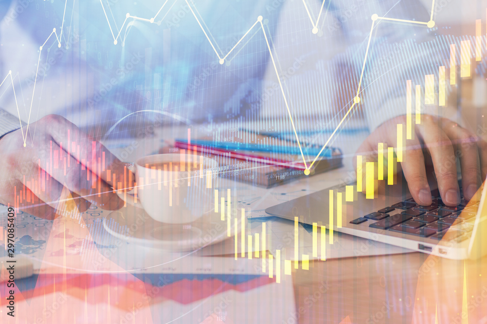 Forex graph with businessman working on computer in office on background. Concept of hardworking. Double exposure. Forex graph with businessman working on computer in office on background. Concept of hardworking. Double exposure.
