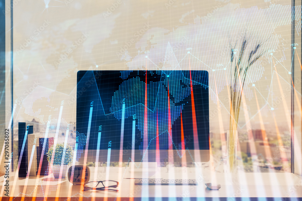 Forex market graph hologram and personal computer on background. Multi exposure. Concept of investment. Forex market graph hologram and personal computer on background. Multi exposure. Concept of investment.