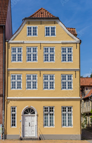 Historic yellow house at the waterfront of Flensburg, Germany