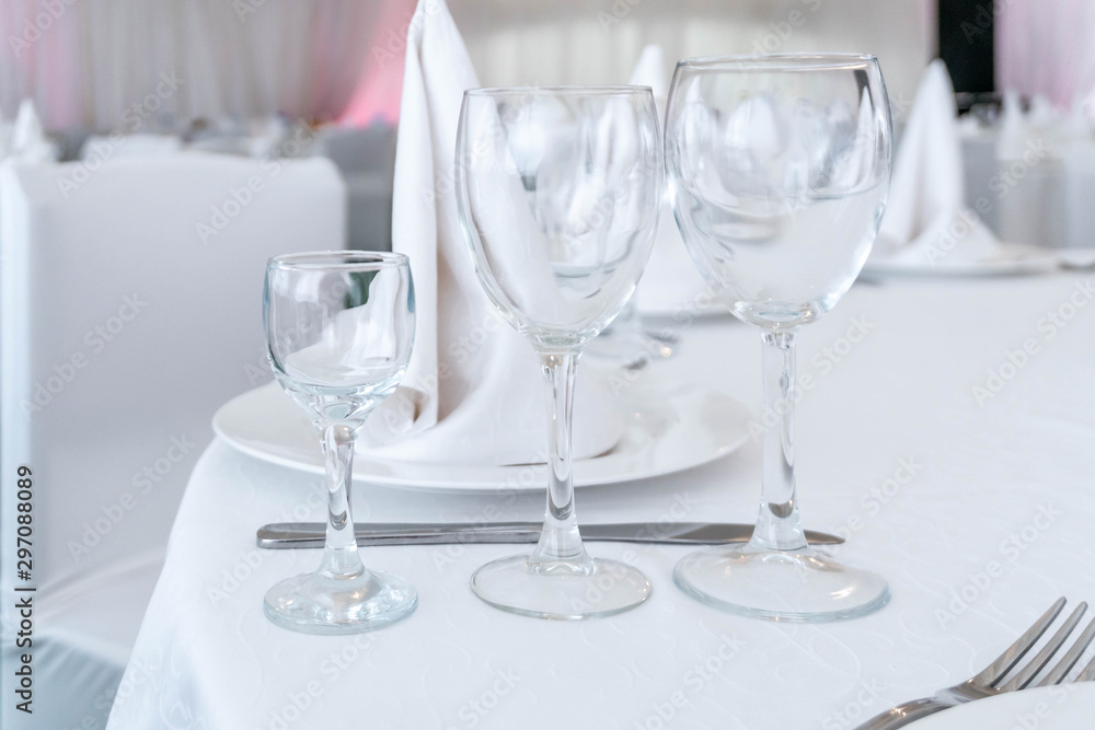 Served banquet table with empty dishes. Served banquet table with empty dishes.