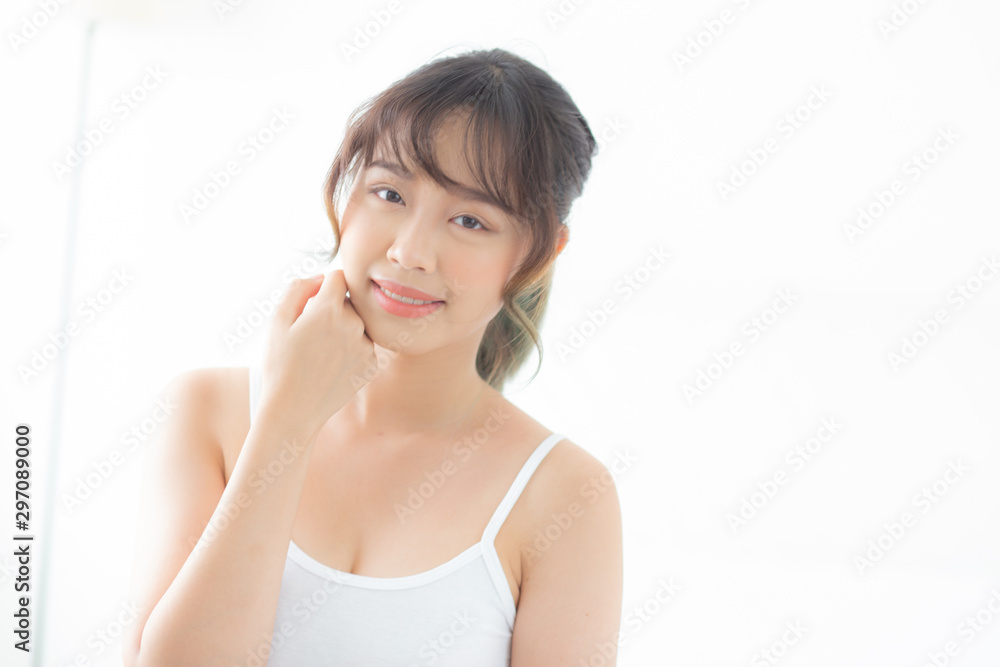 Portrait of beautiful young asian woman smile while wake up healthy and wellness with sunrise at morning in the bedroom, asia girl skin care with happy with fresh, lifestyle and relax concept. Portrait of beautiful young asian woman smile while wake up healthy and wellness with sunrise at morning in the bedroom, asia girl skin care with happy with fresh, lifestyle and relax concept.
