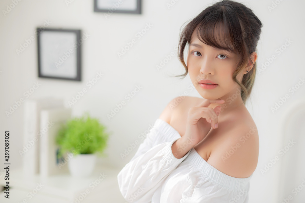 Portrait of beautiful young asian woman makeup of cosmetic, girl happy and smile attractive, face of beauty perfect with wellness in the bedroom at home with skin care and healthcare concept. Portrait of beautiful young asian woman makeup of cosmetic, girl happy and smile attractive, face of beauty perfect with wellness in the bedroom at home with skin care and healthcare concept.