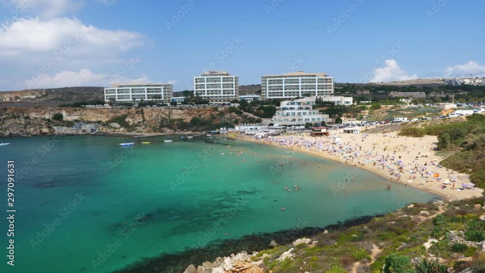 Golden Bay sandy beach in Malta, panning shot Golden Bay sandy beach in Malta, panning shot