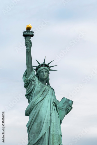 USA, New York - May 2019: Statue of Liberty, Liberty Island against an overcast sky