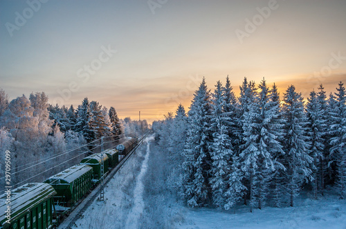Evening Train in Winter at Sunset