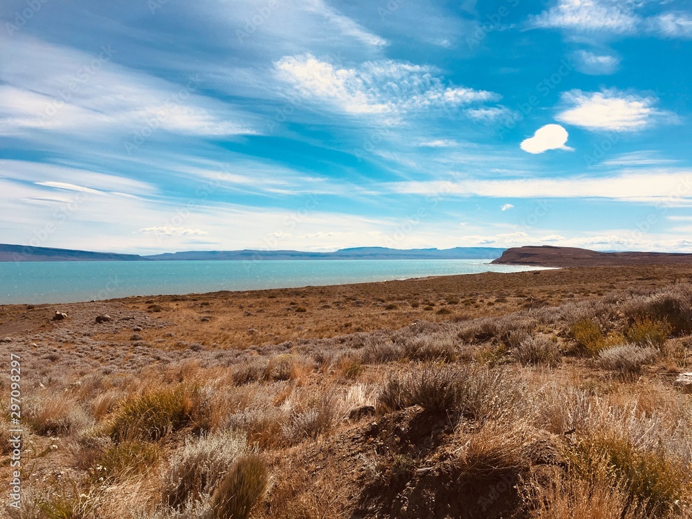 landscape with sand dunes and blue sky landscape with sand dunes and blue sky
