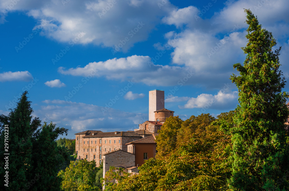 Obraz premium View of the beautiful Perugia medieval historic center at sunset with the tall and ancient Sciri Tower