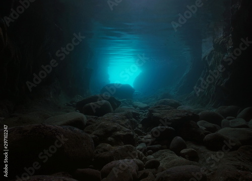 Rocks underwater inside a cave on the seashore, natural scene, Mediterranean sea, Spain, Palamos, Costa Brava, Catalonia
