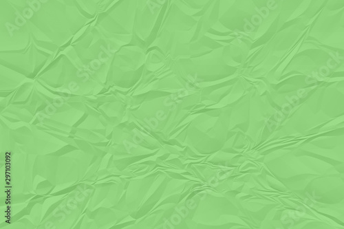 crumpled green paper background close up