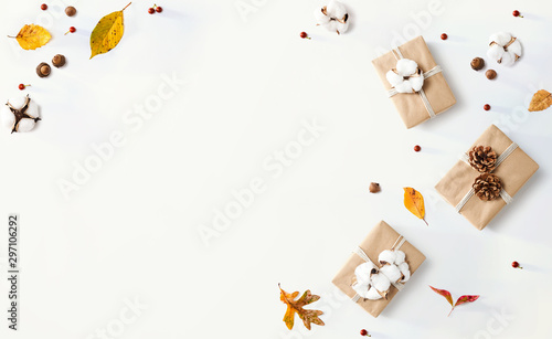Gift boxes with autumn theme - overhead view flat lay