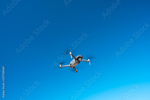 Fototapeta Naklejka Na Ścianę i Meble -  Drone is flying, drone is waiting for flight, sky is clean blue