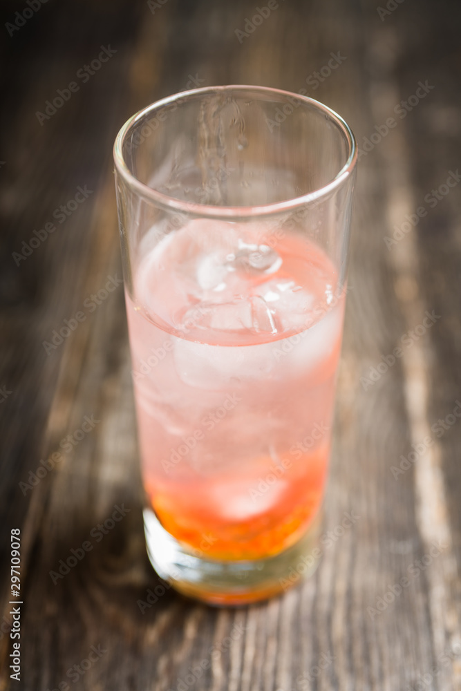 Sweet cocktail with figs liqueur and thyme. Selective focus. Shallow depth of field. Sweet cocktail with figs liqueur and thyme. Selective focus. Shallow depth of field.