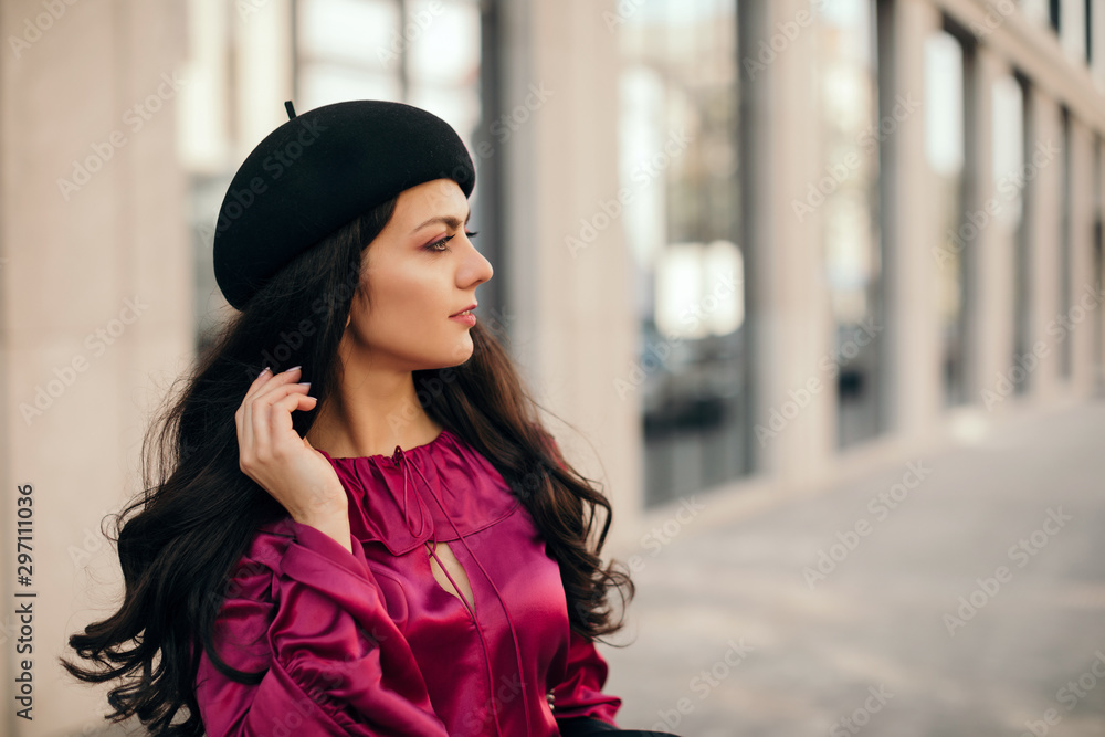 beautiful brunette woman in retro hat walking around the city. copy space beautiful brunette woman in retro hat walking around the city. copy space