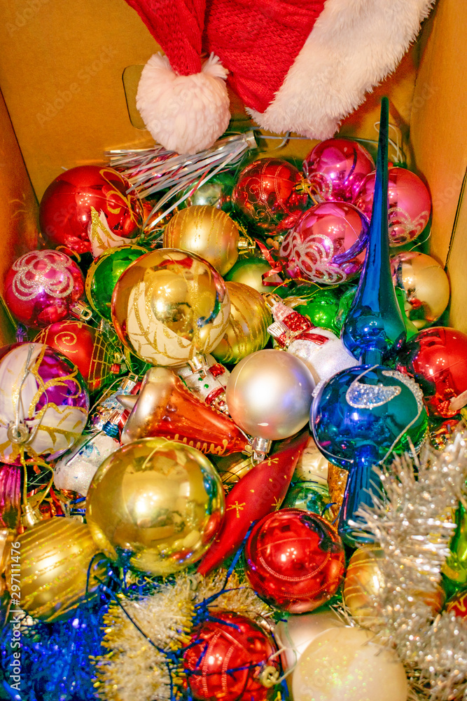 A box full of Christmas tree decorations for holiday fun and joy.