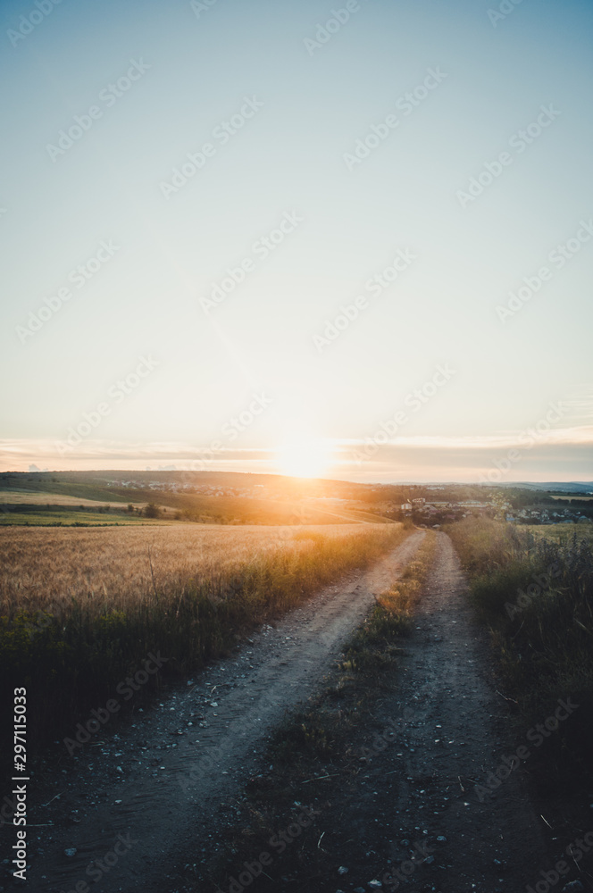 Road in the middle of nowhere during sunset Road in the middle of nowhere during sunset