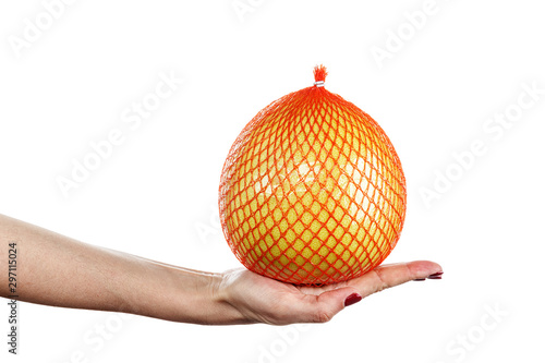 citrus pomelo in hand