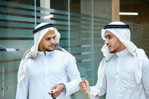 Two busy sheikhs talking to each other. Go and speak © alfa27