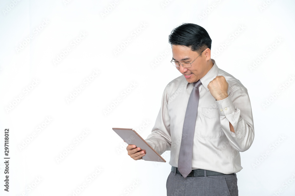 Happy middle-aged Asian men using tablets on a white background Happy middle-aged Asian men using tablets on a white background