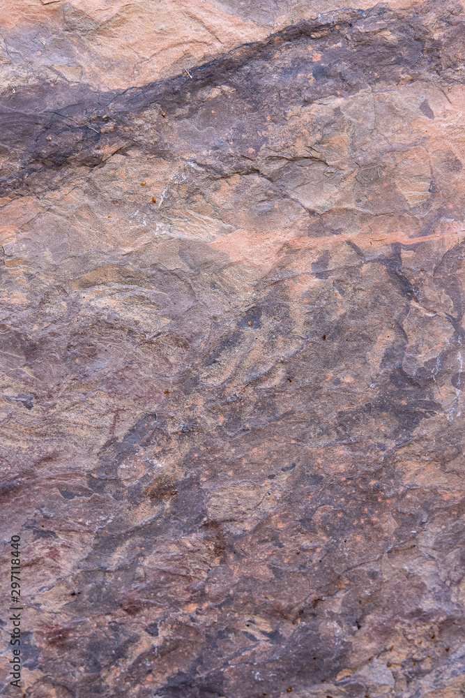 seamless background texture of natural raw stone brown granite