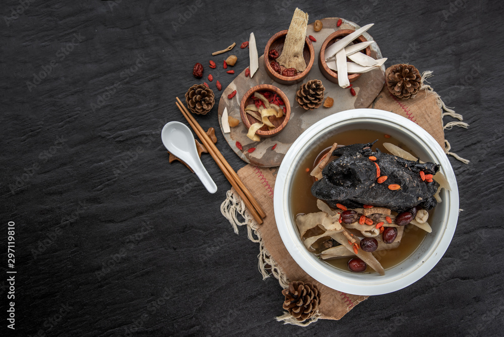 Chinese traditional nourishing health stew, stewed black bone chicken, Chinese black chicken soup, This soup very famous among chinese food and asian food as a healthy soup, food as medicine.