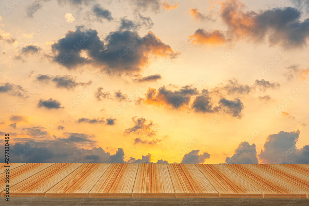 wooden table with view Sunset sky  backdrop.you can used for display products. or add your own text on space.