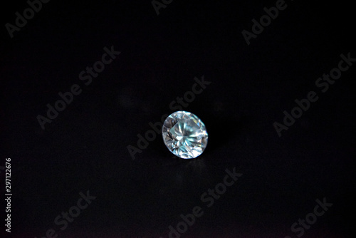 one diamond of classic shape on the black background