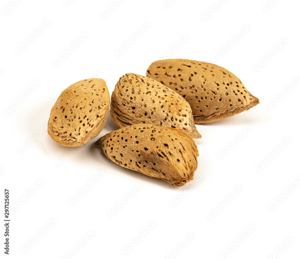Almond nut in shell isolated on white background close up Almond nut in shell isolated on white background close up