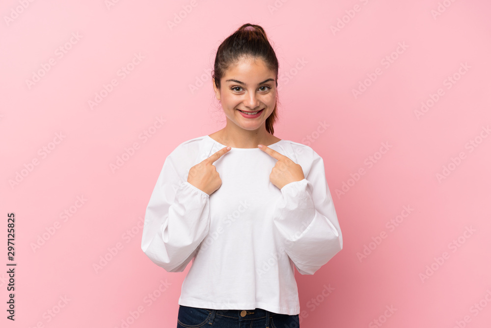 Young brunette girl over isolated pink background with surprise facial expression Young brunette girl over isolated pink background with surprise facial expression