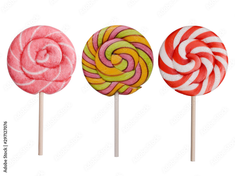 Three multi-coloured Christmas candies in different colors, on a white background Three multi-coloured Christmas candies in different colors, on a white background