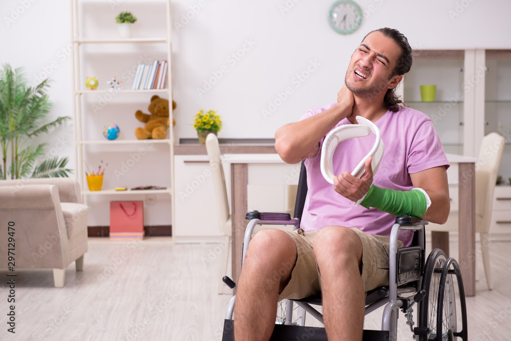 Young man suffering at home after car accident Young man suffering at home after car accident