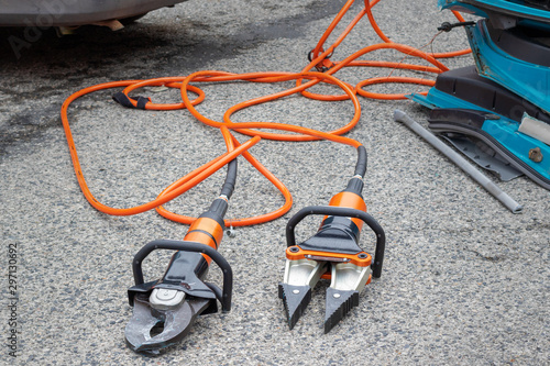 Foto Hydraulic extrication tools, rescue shears and spreader for saving people from d