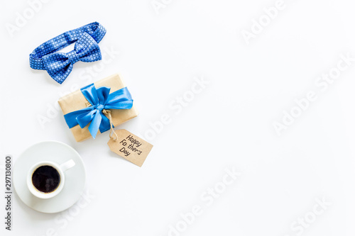 Father's Day concept with bow tie, present box and concept. on white background top view frame copy space photo