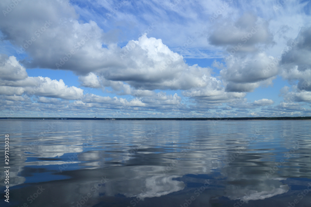 Beautiful seascape, clouds reflected in the sea , View from a boat