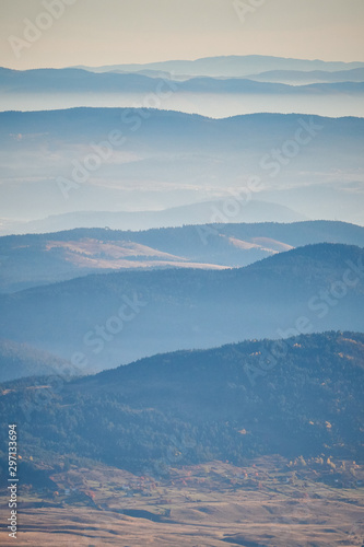 Morning fog/mist under the mountains. Montenegro mountains. Vertical photo. © Inna Gritsinova