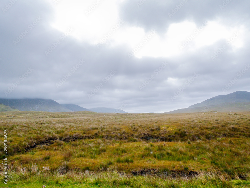Hills and mountain in Connemara National park, Low clouds, Ireland, county Galway. Hills and mountain in Connemara National park, Low clouds, Ireland, county Galway.