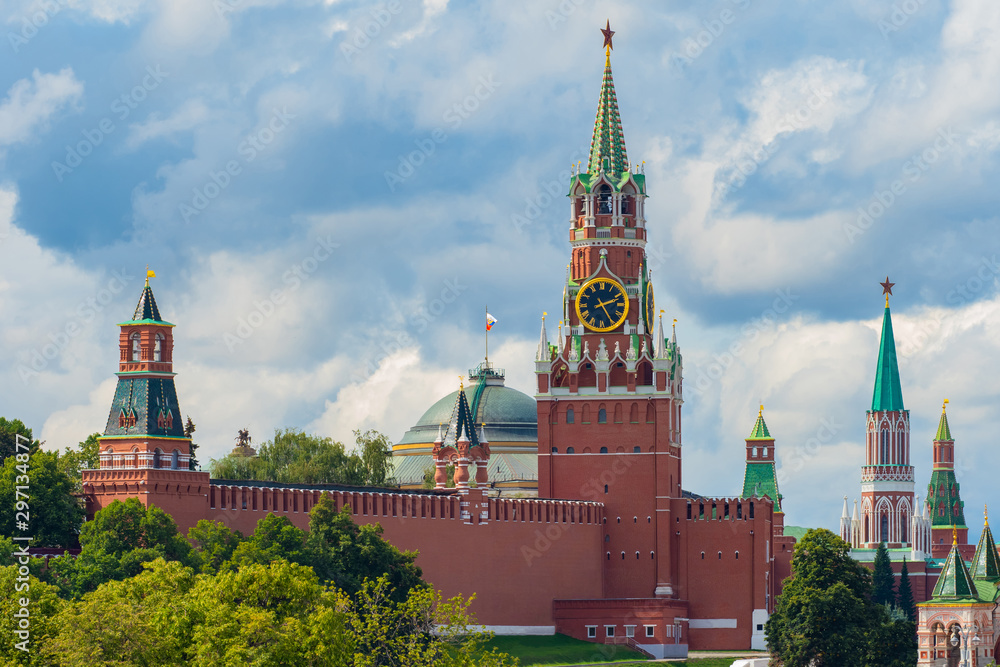 Moscow. Russia. Kremlin on a summer day. Spasskaya tower of the Kremlin with a star and chimes. Symbol of the capital of the Russian Federation. Architecture of Moscow. Moscow. Russia. Kremlin on a summer day. Spasskaya tower of the Kremlin with a star and chimes. Symbol of the capital of the Russian Federation. Architecture of Moscow.